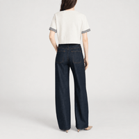 FRAME The Off Duty Drawstring Bow Jeans in Rinse at Riada Concept. High-rise fluid denim with a curved leg and drawstring waist - back view