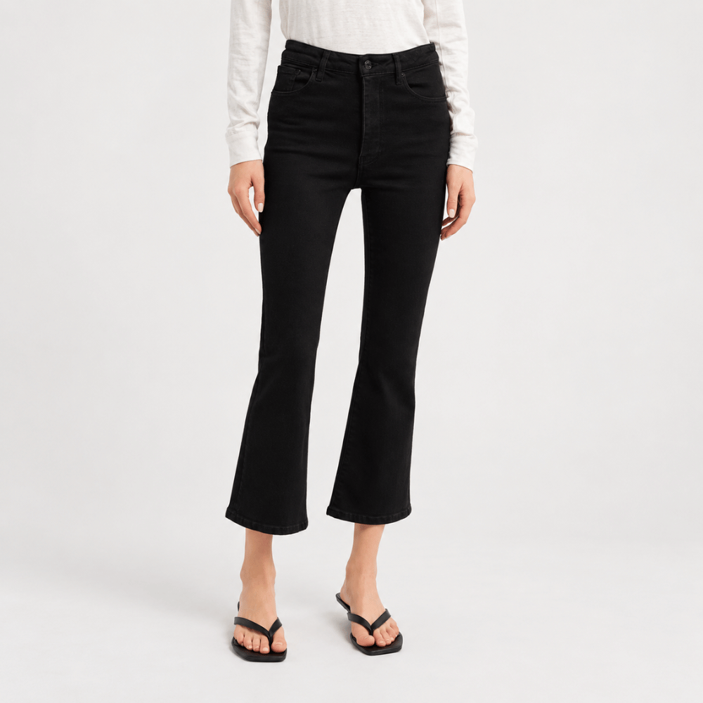 FRAME The Reboot Crop Jeans in Levitate at Riada Concept. High-rise black bootcut jeans in super-stretch denim with a 27-inch inseam and cropped flare - front view