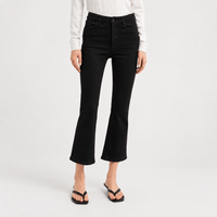 FRAME The Reboot Crop Jeans in Levitate at Riada Concept. High-rise black bootcut jeans in super-stretch denim with a 27-inch inseam and cropped flare - front view