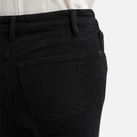 FRAME The Reboot Crop Jeans in Levitate at Riada Concept. High-rise black bootcut jeans in super-stretch denim with a 27-inch inseam and cropped flare - waistband and back pocket view
