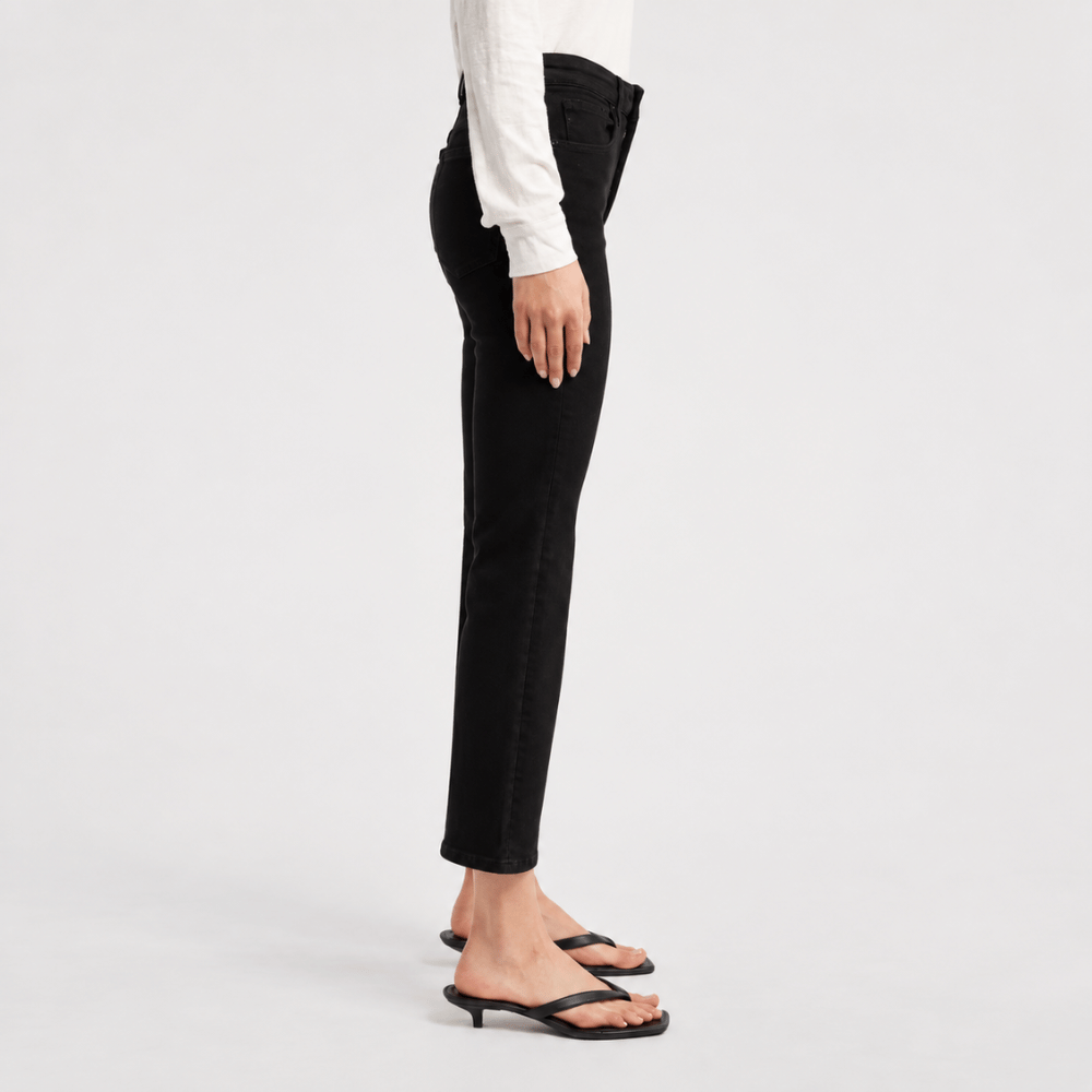 FRAME The Reboot Crop Jeans in Levitate at Riada Concept. High-rise black bootcut jeans in super-stretch denim with a 27-inch inseam and cropped flare - side view