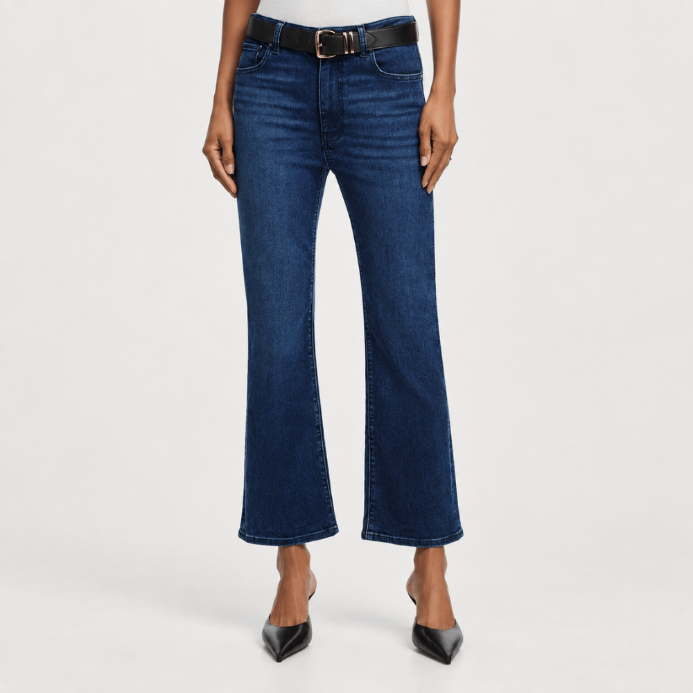 FRAME The Reboot Crop Jeans in Trick dark indigo high-rise cropped bootcut on model - front