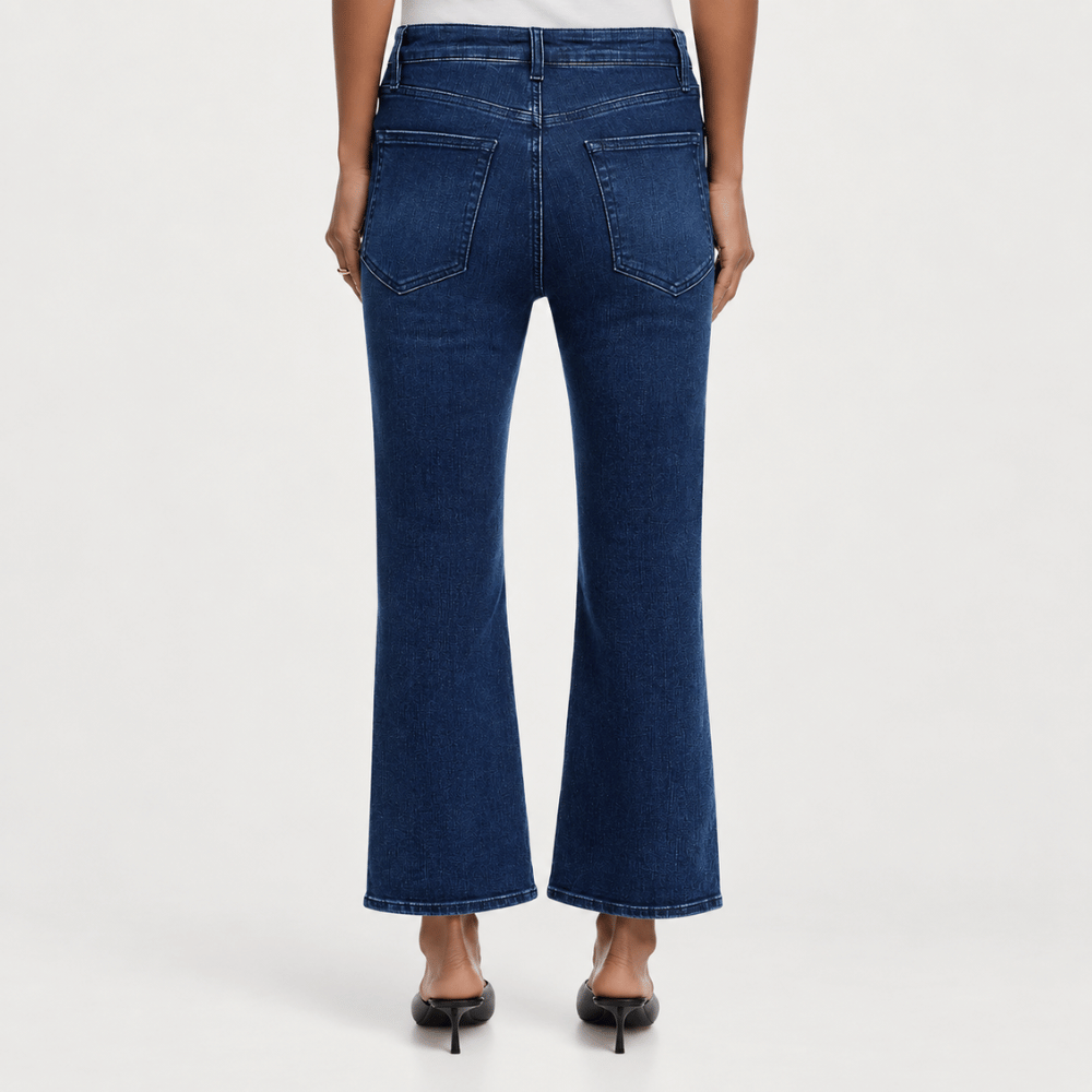 FRAME The Reboot Crop Jeans in Trick dark indigo high-rise cropped bootcut on model - back