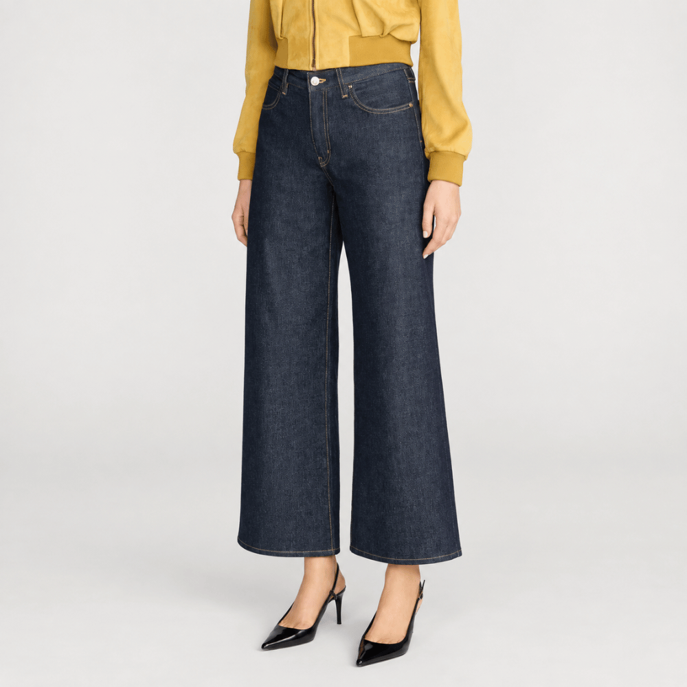 FRAME The Swing Jeans in Rinse at Riada Concept. High-rise cropped wide-leg jeans in rigid dark-indigo regenerative cotton - angle view