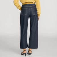 FRAME The Swing Jeans in Rinse at Riada Concept. High-rise cropped wide-leg jeans in rigid dark-indigo regenerative cotton - back view