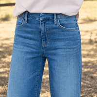 Frank & Eileen Galway 32" wide-leg jeans in 2002 Wash, close view showing mid-rise waistband and pockets