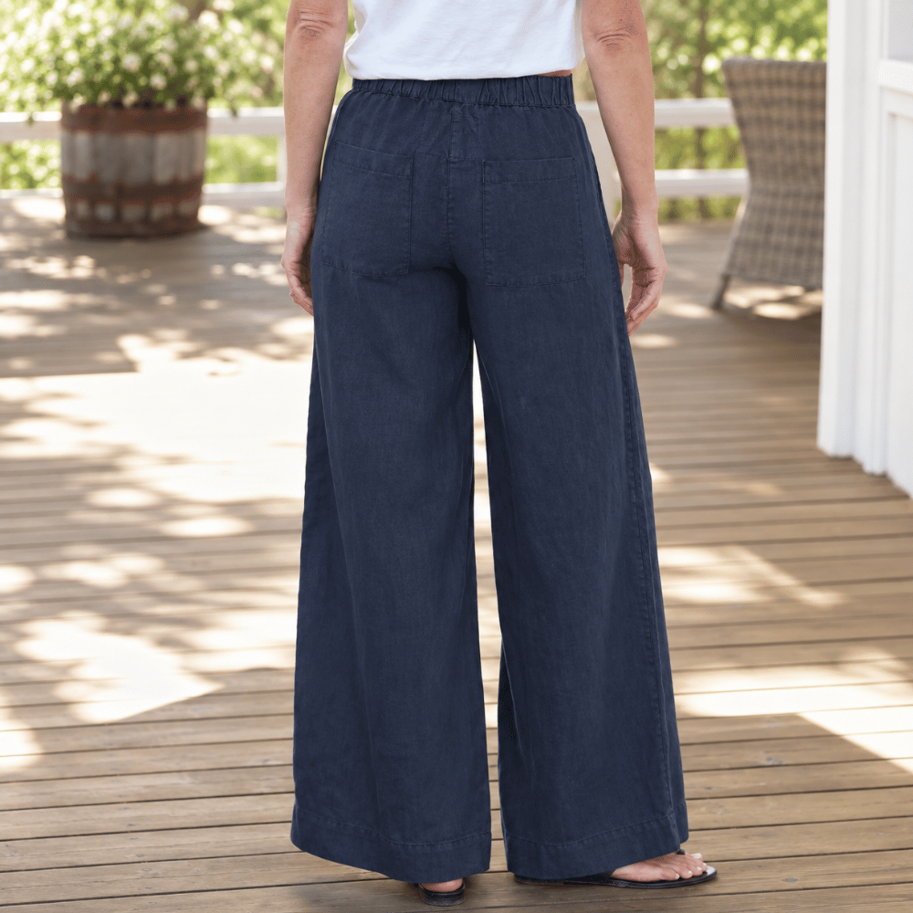 Frank & Eileen Madeline navy linen pants, back view showing elastic waistband, patch pockets and full-length wide leg
