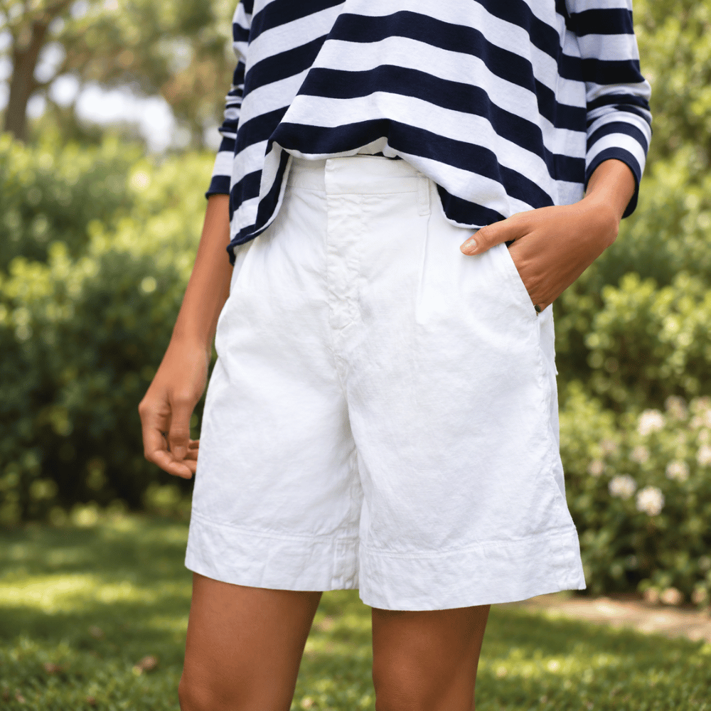 Frank & Eileen Waterford 7.5" linen shorts in White, angled view showing high-rise waist, pockets and wide leg