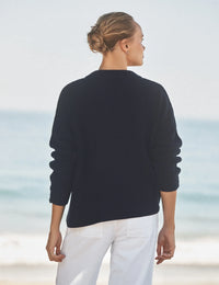 Back view of Cotton Montecito Cardigan by Frank & Eileen at Riada Concept, front view with horn button closure on model. Frank and Eileen stockist Australia available at Riada Concept Luxury Fashion Boutique Australia.
