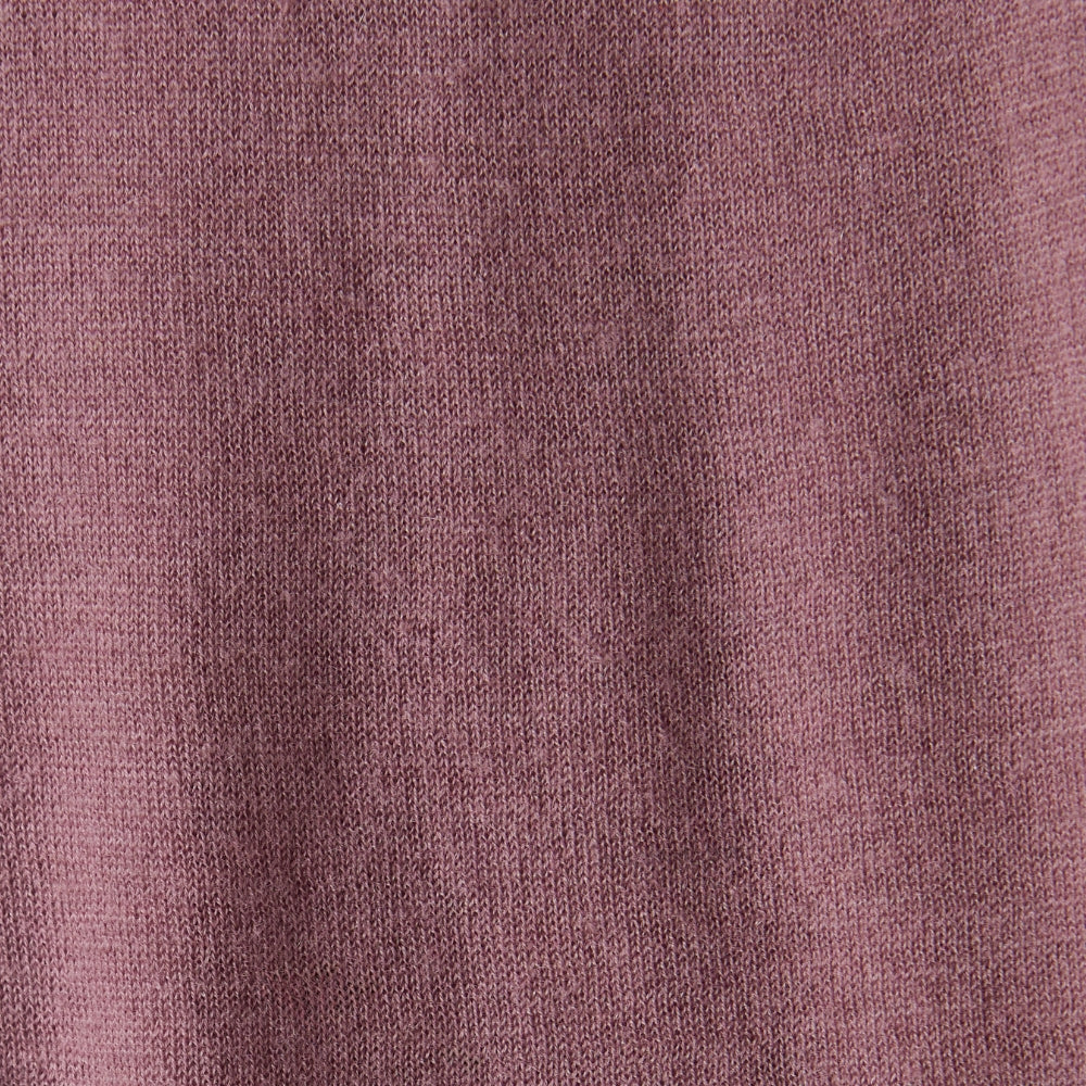 Detail of the semi-sheer lilac Cashair cashmere knit of the JOSEPH Geras jumper