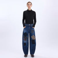 HIGH Everyday Couture Happily boyfriend jeans in washed blue denim with striped, polka-dot and checked suiting patches, full model front view