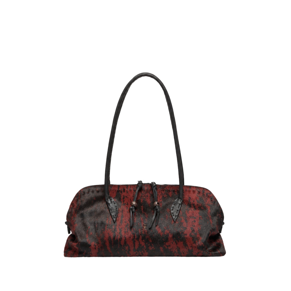 Riada Concept Henry Beguelin’s Bolla Bassa in streaked wine pony-hair calf: a low, rounded shoulder bag with black leather handles and beaded pulls, handcrafted in Italy.