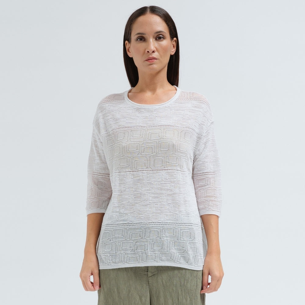 An oversized white jacquard knit by Transit Par Such with a round neck, dropped shoulders, elbow-length sleeves and semi-sheer openwork stripes - front view