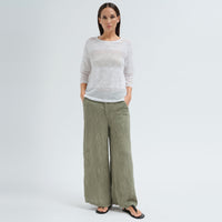 An oversized white jacquard knit by Transit Par Such with a round neck, dropped shoulders, elbow-length sleeves and semi-sheer openwork stripes - full front view