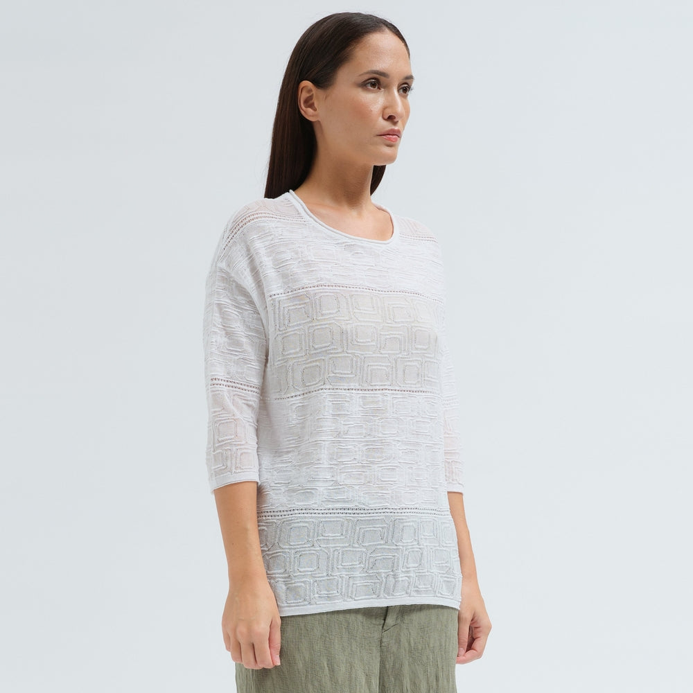 An oversized white jacquard knit by Transit Par Such with a round neck, dropped shoulders, elbow-length sleeves and semi-sheer openwork stripes - angle view