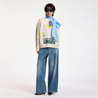 Riada Concept Essentiel Antwerp relaxed cream cotton sweatshirt, covered in colourful slogans, with a sequinned heart, beaded sleeve lettering and a 1999 back panel, full model front view