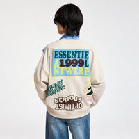Riada Concept Essentiel Antwerp relaxed cream cotton sweatshirt, covered in colourful slogans, with a sequinned heart, beaded sleeve lettering and a 1999 back panel, crop model back view