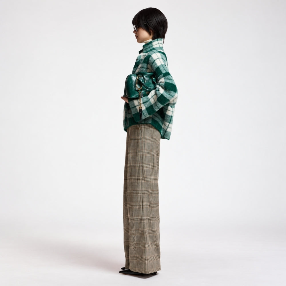 Riada Concept Essentiel Antwerp Karreau knit cardigan in a forest green and off-white check, double-breasted with notched lapels, dropped shoulders and slanted pockets - styled model side view