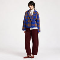 Riada Concept Essentiel Antwerp Karreau check knit cardigan in Indigo Ink, worn on model, front view styled