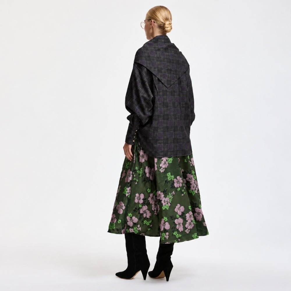 Riada Concept A full circle midi skirt by Essentiel Antwerp in khaki floral jacquard with pink and green flowers, a fitted waistband, side-seam pockets and a full lining - styled model back view