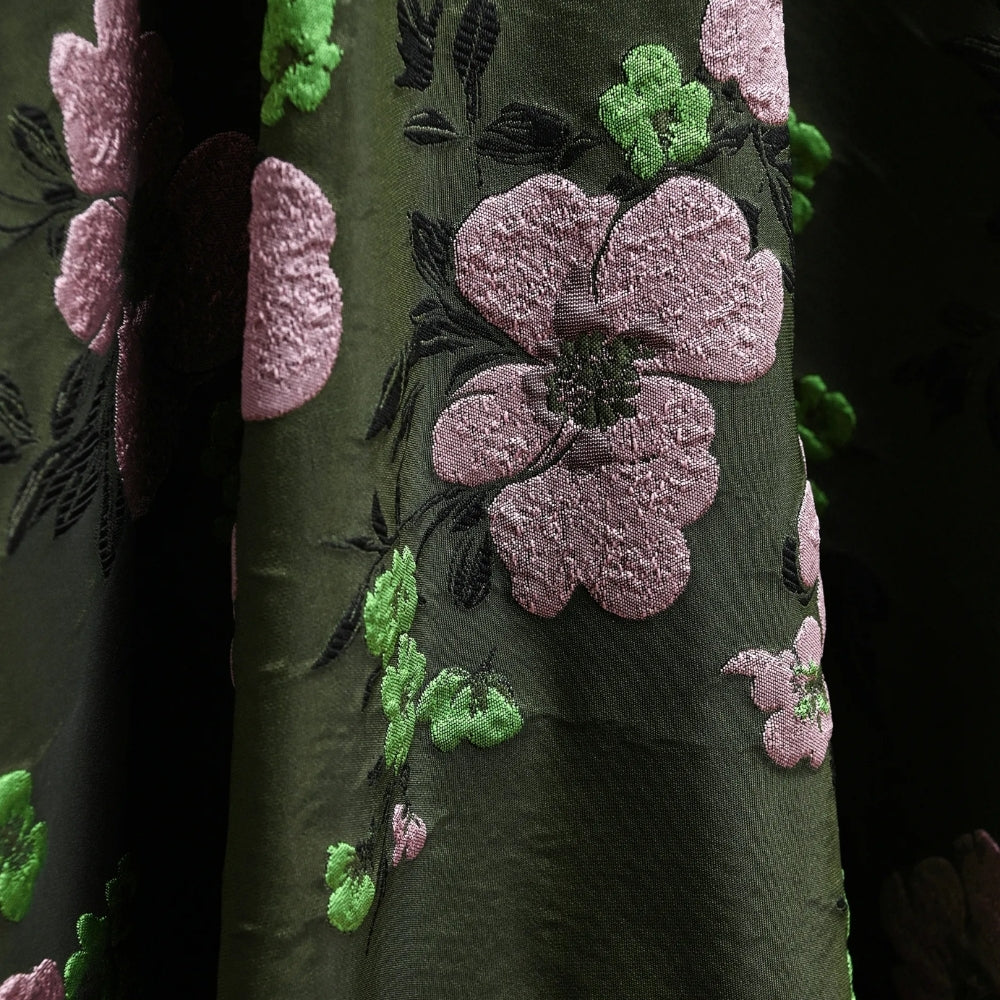 Riada Concept A full circle midi skirt by Essentiel Antwerp in khaki floral jacquard with pink and green flowers, a fitted waistband, side-seam pockets and a full lining - close up of floral jacquard