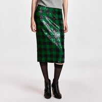 Riada Concept Essentiel Antwerp green and black check pencil skirt, covered in sequins on stretch jersey, with an elasticated waistband and a back slit. Midi length - front crop view