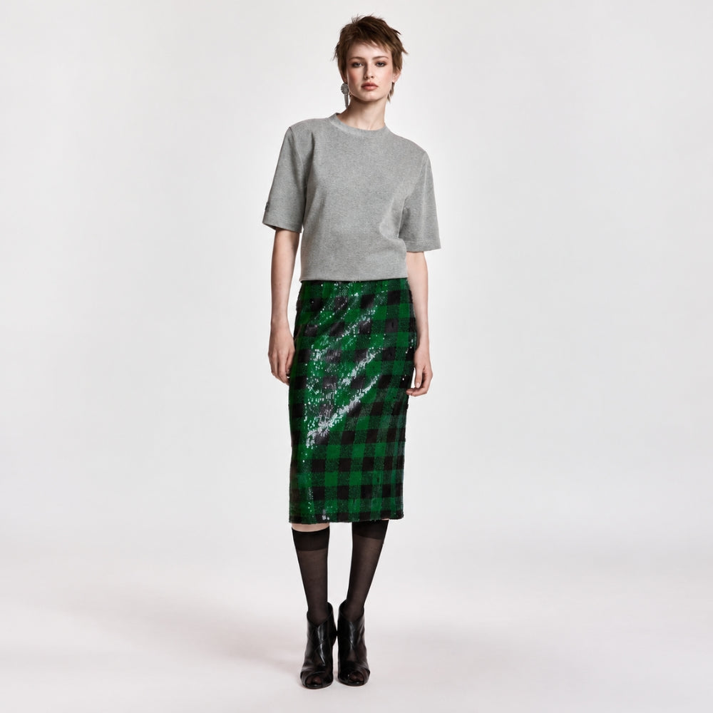 Riada Concept Essentiel Antwerp green and black check pencil skirt, covered in sequins on stretch jersey, with an elasticated waistband and a back slit. Midi length - front full model view