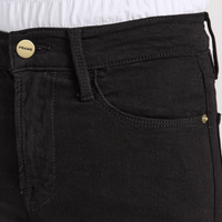 Close-up of FRAME Le High Straight Ankle Jeans in Film Noir at Riada Concept. High-rise slim straight jeans in ultra-stretch black denim - showing the front waistband, belt loops, button closure with a gold-tone 'FRAME' button, and the front pocket.