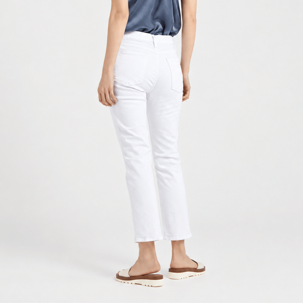 FRAME Le High Straight Cropped Jeans in Blanc at Riada Concept. High-rise slim straight white denim with strong stretch recovery - back view
