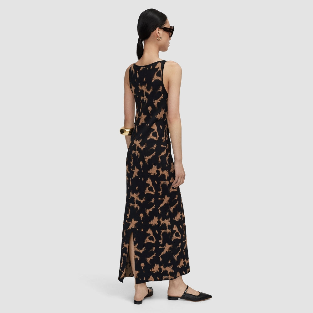 Back view of the JOSEPH Lecate tortoiseshell knit dress, showing the slit at the hem