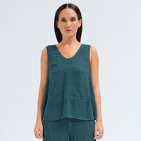 A sleeveless petrol tank by Transit Par Such with a V-neck, a linen upper and a viscose georgette lower that widens to the hem - front view