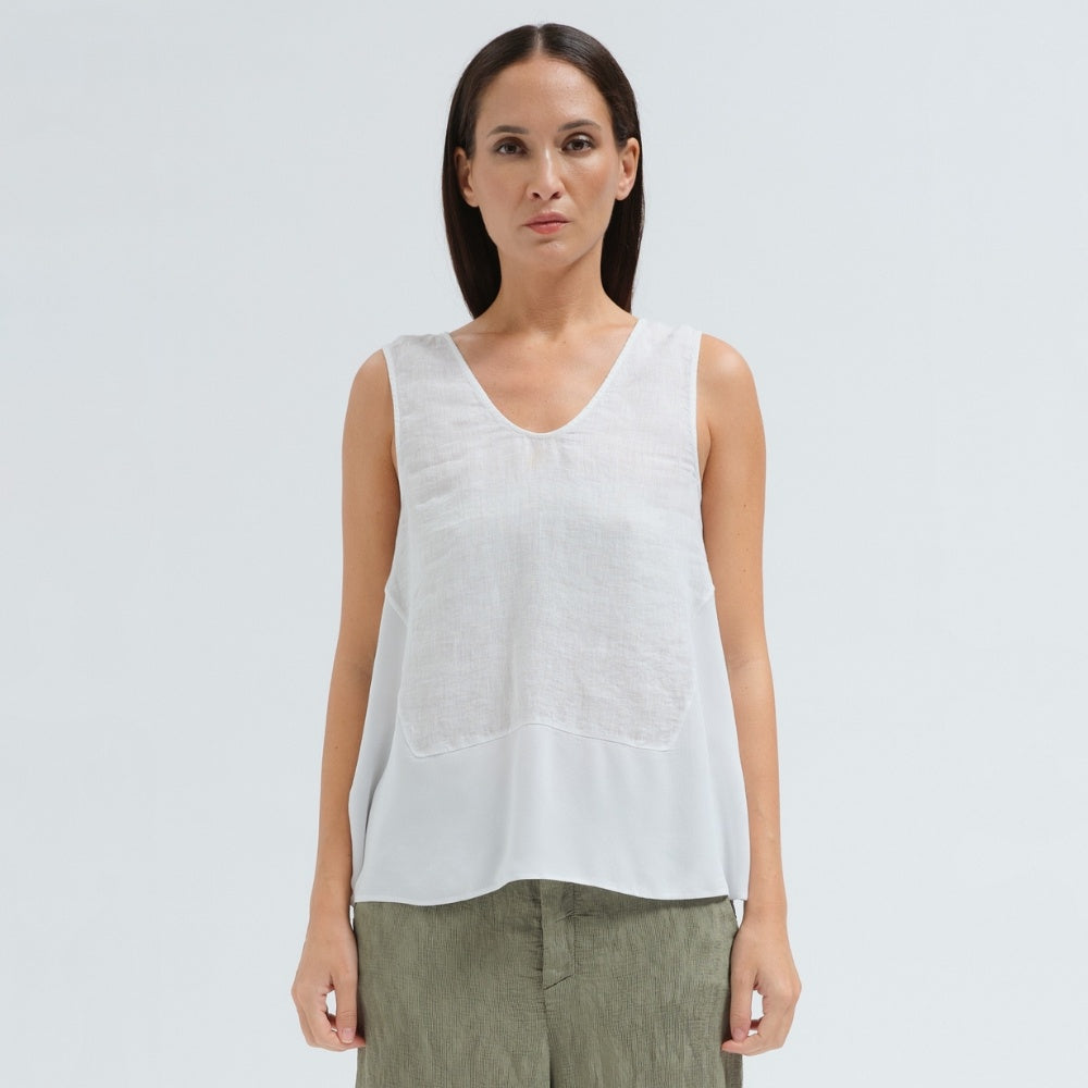 A sleeveless white tank by Transit Par Such with a V-neck, a linen upper and a viscose georgette lower that widens to the hem - front view
