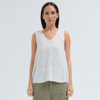 A sleeveless white tank by Transit Par Such with a V-neck, a linen upper and a viscose georgette lower that widens to the hem - front view