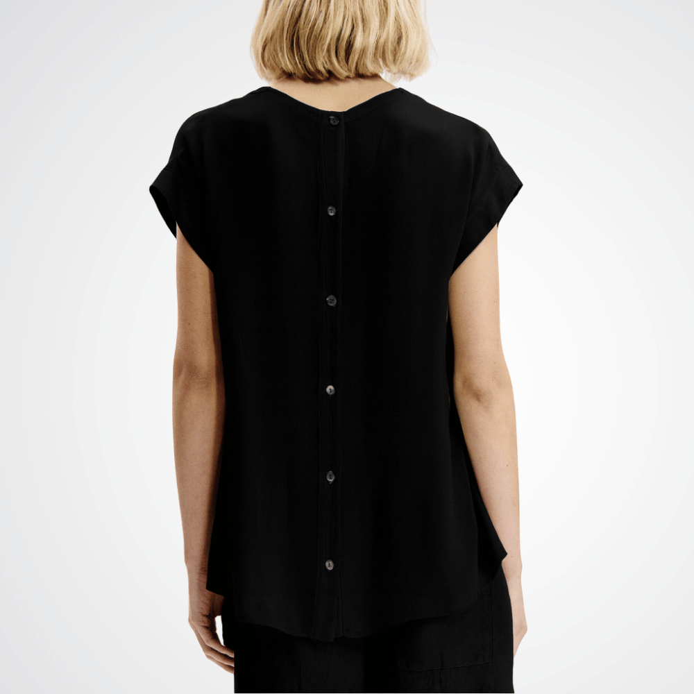 Transit Par Such Linen Cap Sleeve Top in Black — Italian-made relaxed fit linen–viscose blend top with cap sleeves and button-through back, paired with black linen pants from Riada Concept. Transit Par Such at Riada Concept Designer fashion shop online and in store High End fashion boutique Sydney Australia Riada Concept
