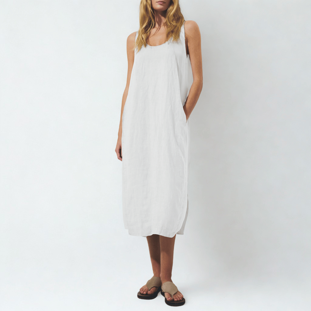 Transit Par Such Linen Dress in White — Italian-made relaxed maxi with scoop neckline, viscose side panels and seam pockets, styled with sandals Transit Par Such at Riada Concept Designer fashion shop online and in store High End fashion boutique Sydney Australia Riada Concept