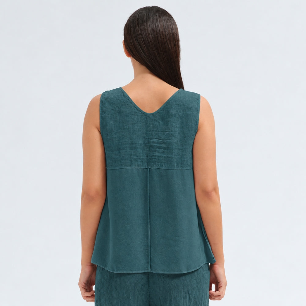 A sleeveless petrol tank by Transit Par Such with a V-neck, a linen upper and a viscose georgette lower that widens to the hem - back view