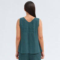 A sleeveless petrol tank by Transit Par Such with a V-neck, a linen upper and a viscose georgette lower that widens to the hem - back view