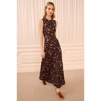 Riada Concept Ulla Johnson Orla sleeveless jersey dress in a black floral print, sculpted at the waist with a relaxed skirt - front model view