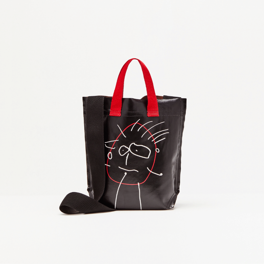 Plan C Pili & Bianca Mini Shopper Bag in Black with white character artwork, red handles and black shoulder strap - rear view
