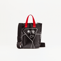 Plan C Pili & Bianca Mini Shopper Bag in Black with white character artwork, red handles and black shoulder strap
