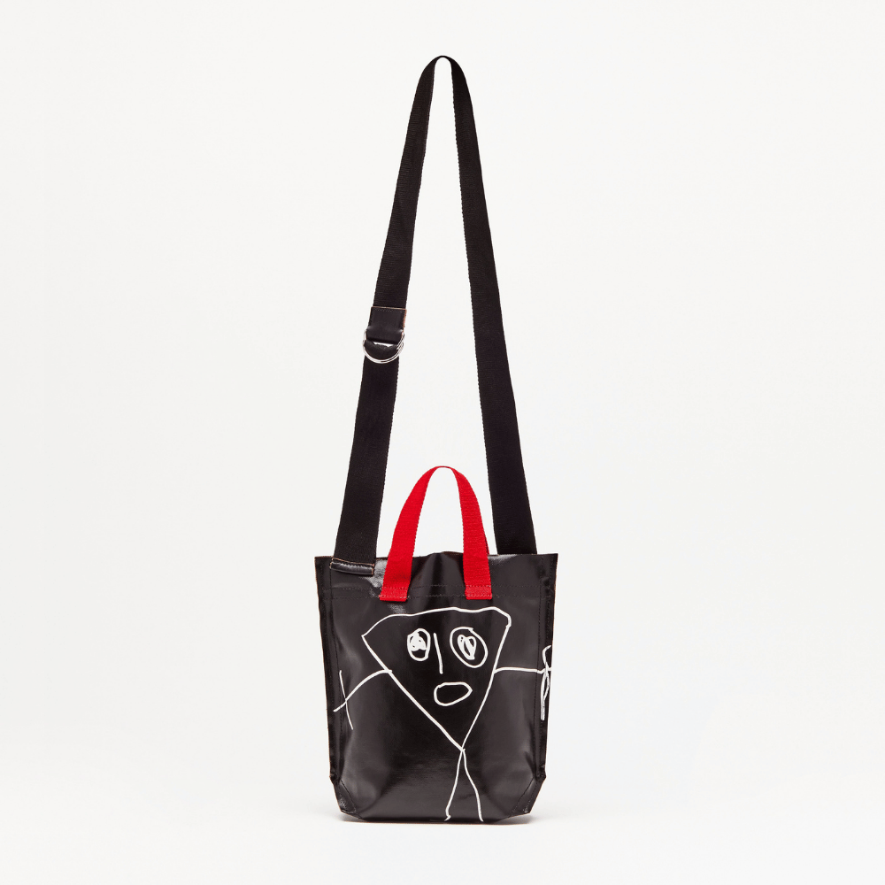 Plan C Pili & Bianca Mini Shopper Bag in Black with white character artwork, red handles and black shoulder strap - front view
