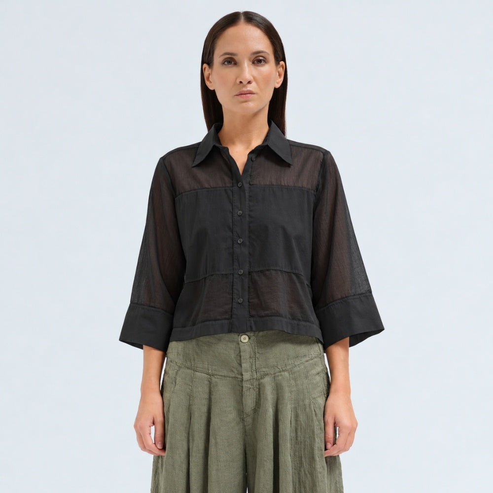 A boxy, cropped black shirt by Transit Par Such in stretch poplin with sheer panels, a pointed collar and three-quarter sleeves with wide cuffs - front view