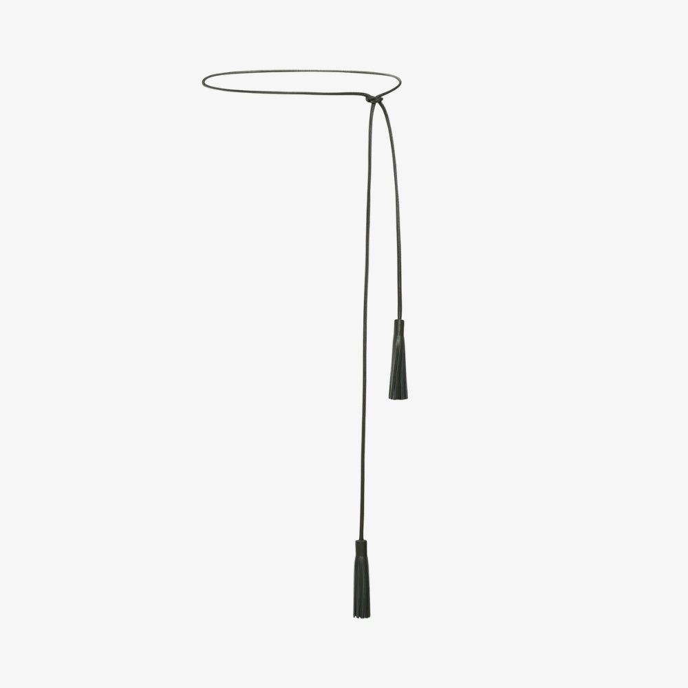Riada Concept Pierre-Louis Mascia tassel belt in smoky olive: a slender nappa lambskin cord that ties at the waist, finished with two leather tassels. Made in Italy