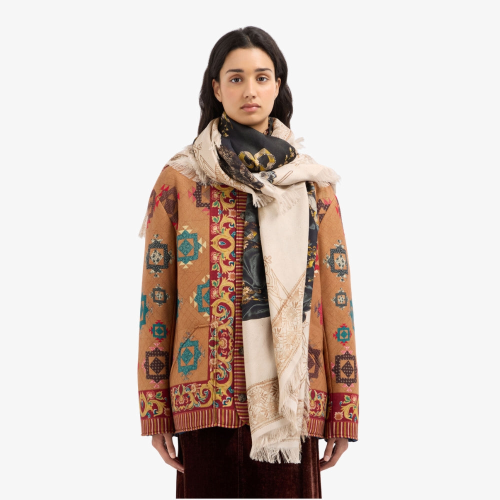 Riada Concept Pierre-Louis Mascia silk shawl printed with an antique black and gold embroidered gown on cream, with gold borders and a fringed edge. Made in Italy - styled model