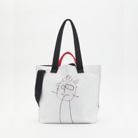 Plan C Printed Medium Shopper Bag in Optical White with black line artwork and contrast black and red handles - front view