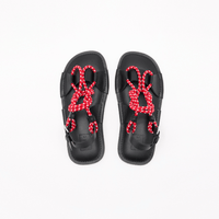 Plan C Cord Detail Leather Slingback Sandals in black with red and white braided cord