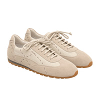 Riada Concept Off-white low-top sneakers by Henry Beguelin in chalky Gesso, mixing soft suede with grained leather and exposed stitching. Handcrafted in Italy - angle view