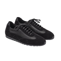 Riada Concept Black low-top sneakers by Henry Beguelin, pairing soft suede with grained leather, exposed stitching and a textured rubber sole. Handcrafted in Italy - angle view