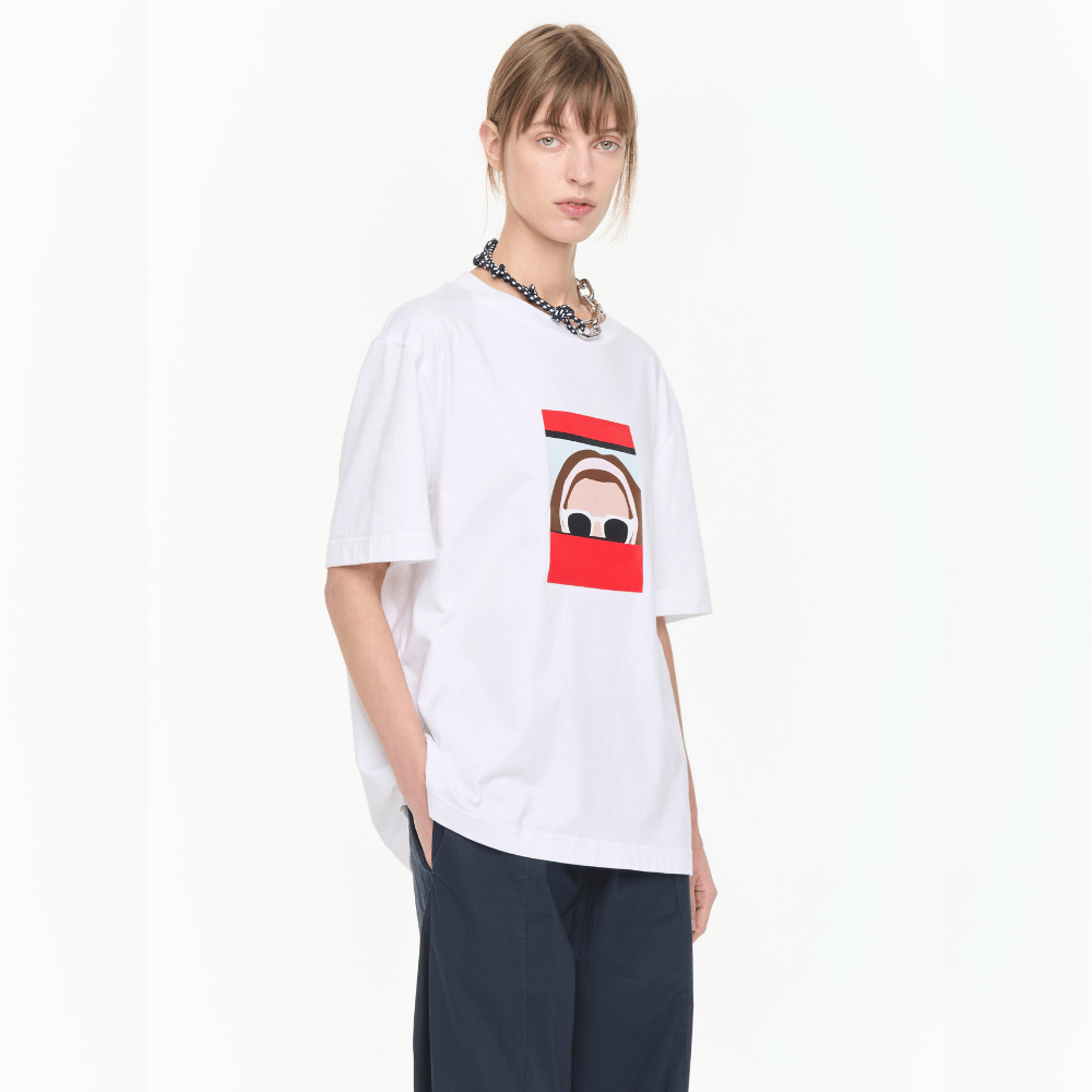 Plan C Self Portrait Print Cotton T-Shirt in Optical White with red graphic artwork styled on model cropped side view