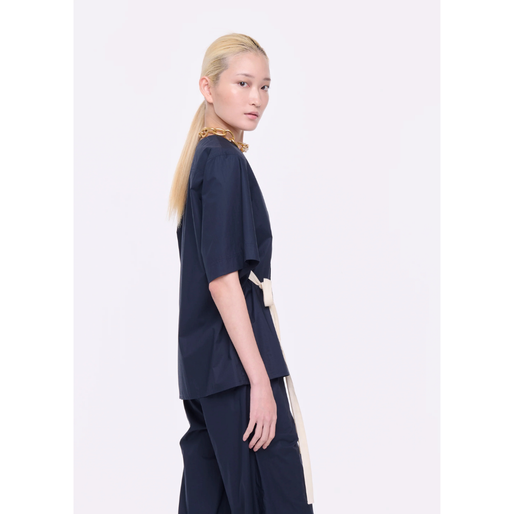 SHORT SLEEVE SHIRT WITH ASYMETRIC PANEL IN BLUE